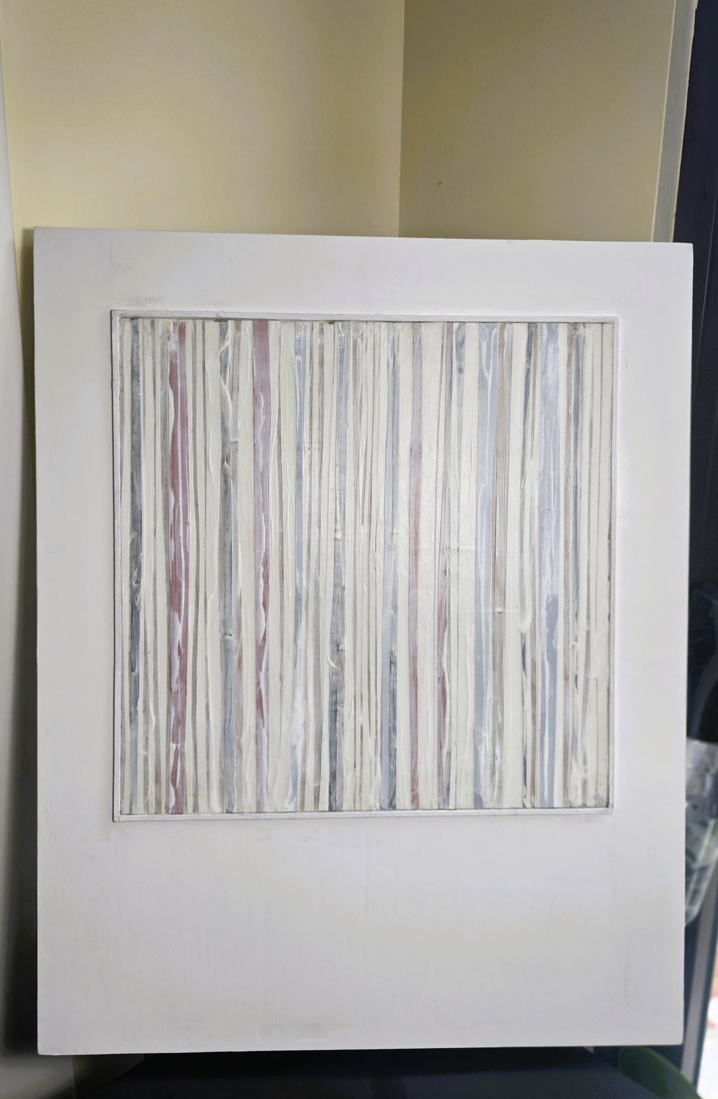 Close-up of Carrie Bergey's In-Line Minimalist Mixed Media Art showing layered textures and vertical lines in white, red, grey, and brown tones.
