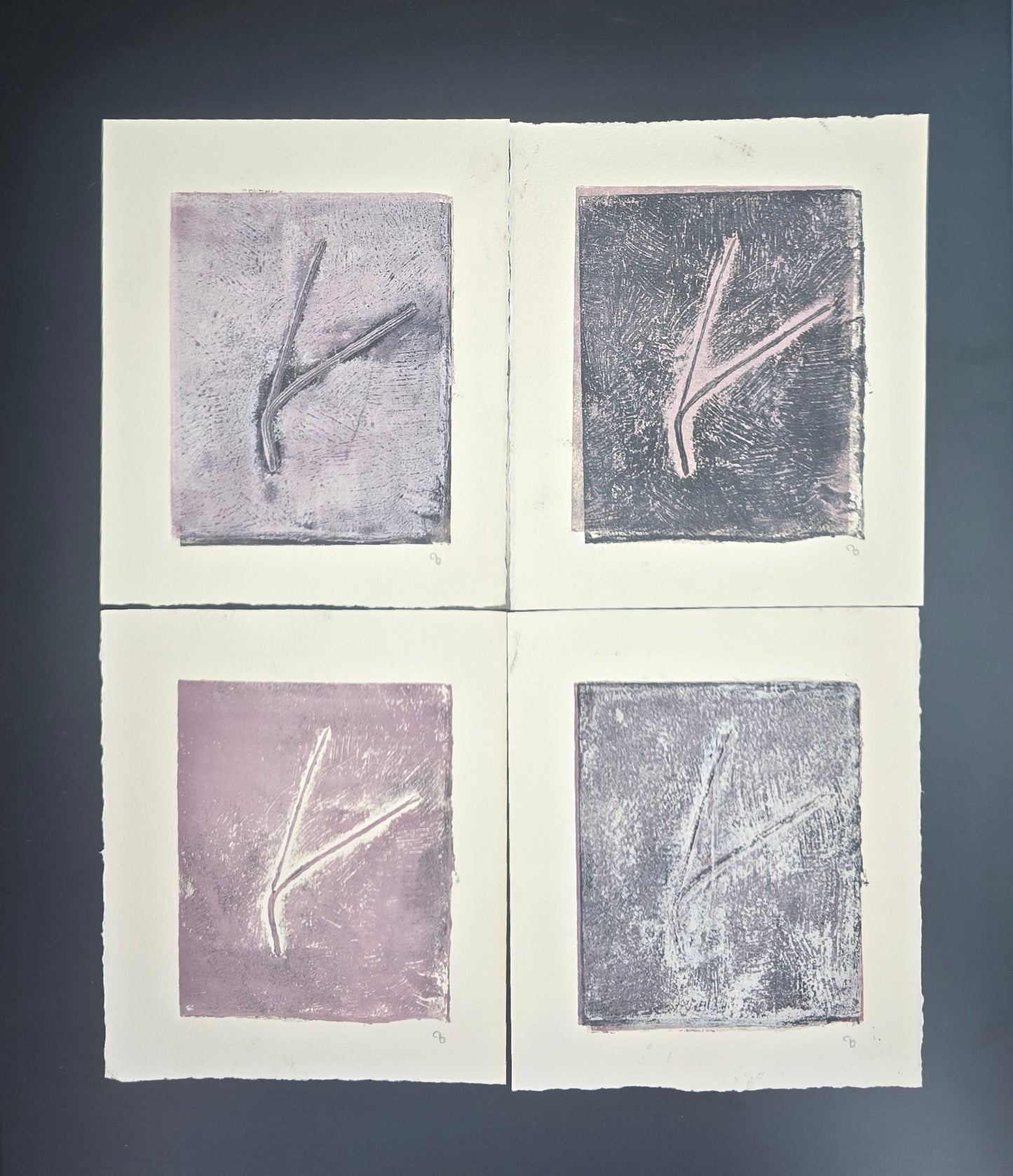 Top-down view of Pine Needles Becoming Original Monoprint Art by Carrie Bergey set of 4, showing varied textures and hues in abstract nature prints.