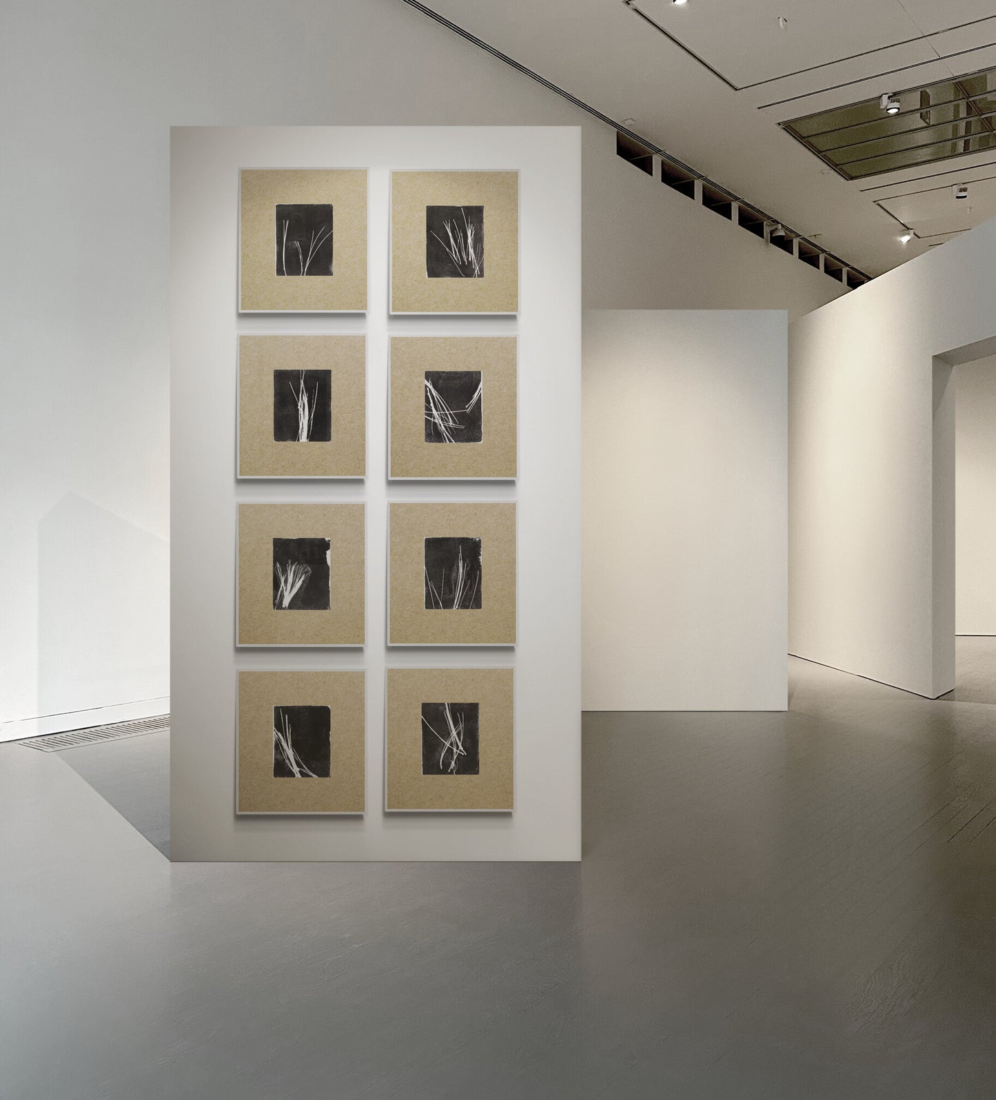 Pine Needles Monoprint Octaptych by Carrie Bergey displayed in a modern gallery with natural matting and black square prints.