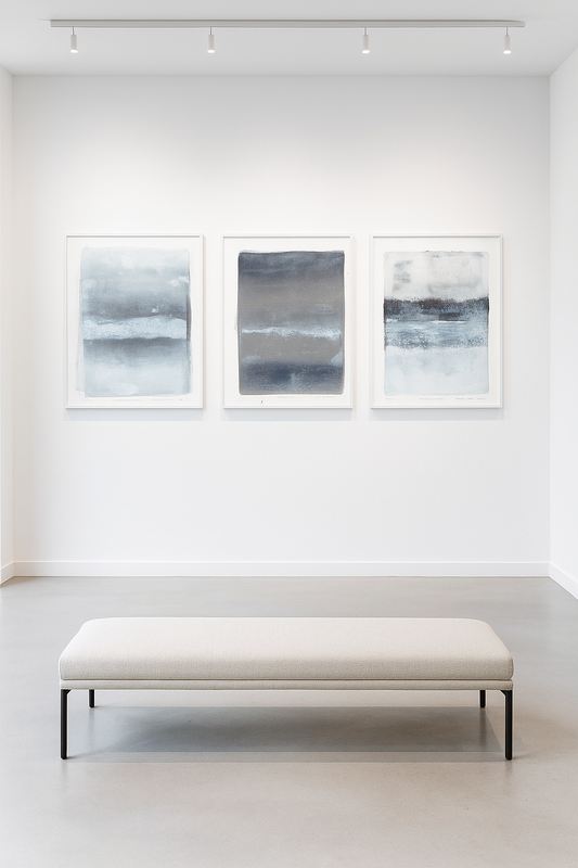 Endemicos Original Fine Art Monoprint Triptych Collection by Carrie Bergey displayed in a modern gallery with minimalist bench seating.