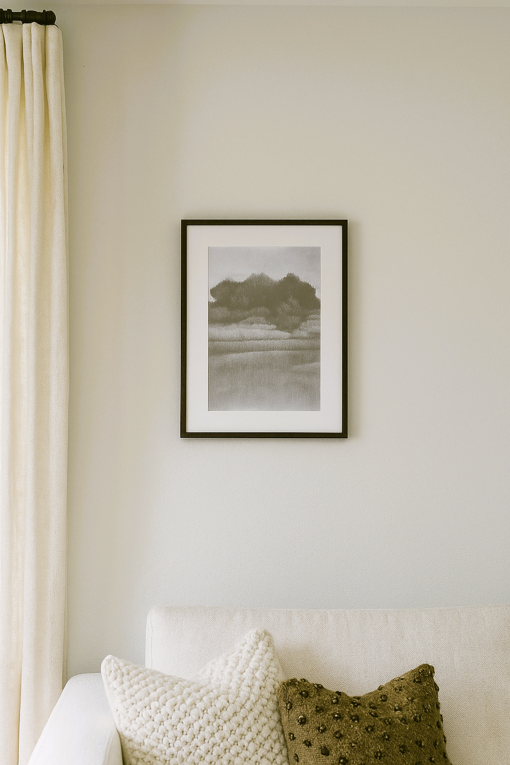 Humble Homestead Original Drawing - art by Carrie Bergey. Framed rural landscape artwork displayed above a neutral-toned sofa, ideal for cozy home decor.