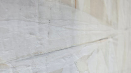 Detail view of Beyond Tiburon - Sailing 18x24 original art by Carrie Bergey highlighting the tactile texture and soft white palette of the sailboat.