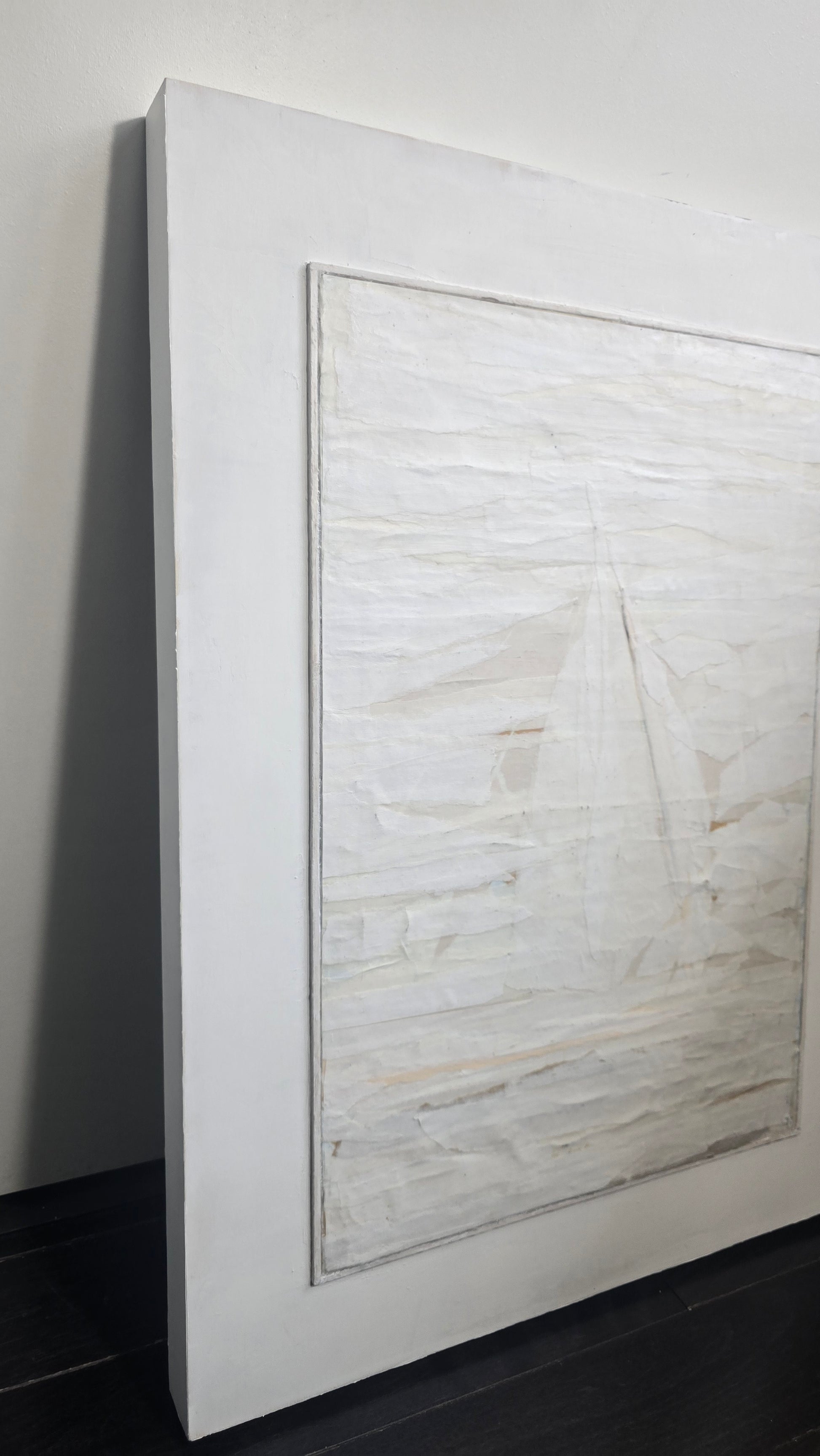 Side angle of Beyond Tiburon - Sailing by Carrie Bergey revealing the depth and texture of the 18x24 mixed media sailboat artwork in white and cream.