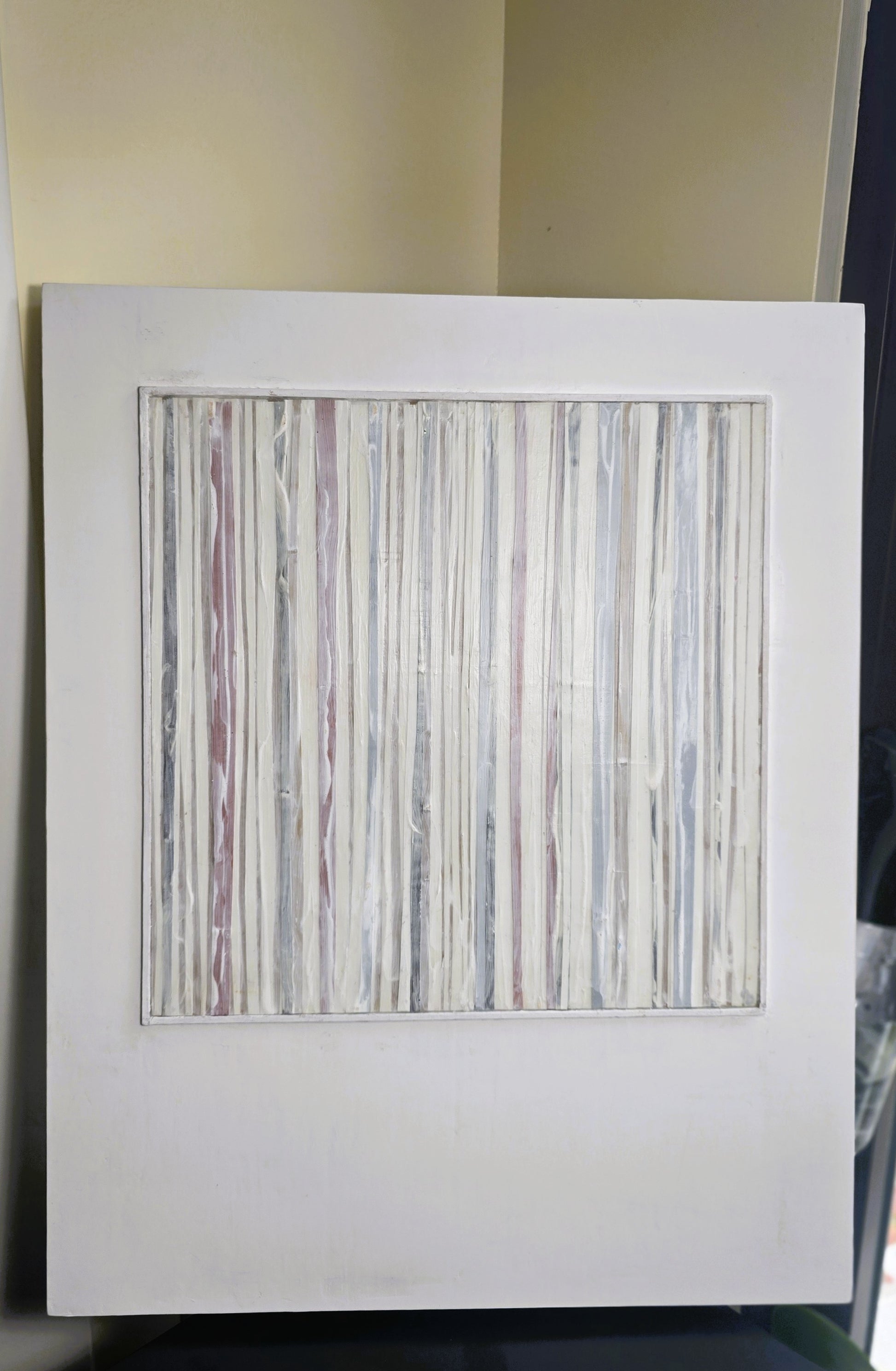 Close-up of Carrie Bergey's In-Line Minimalist Mixed Media Art showing layered textures and vertical lines in white, red, grey, and brown tones.