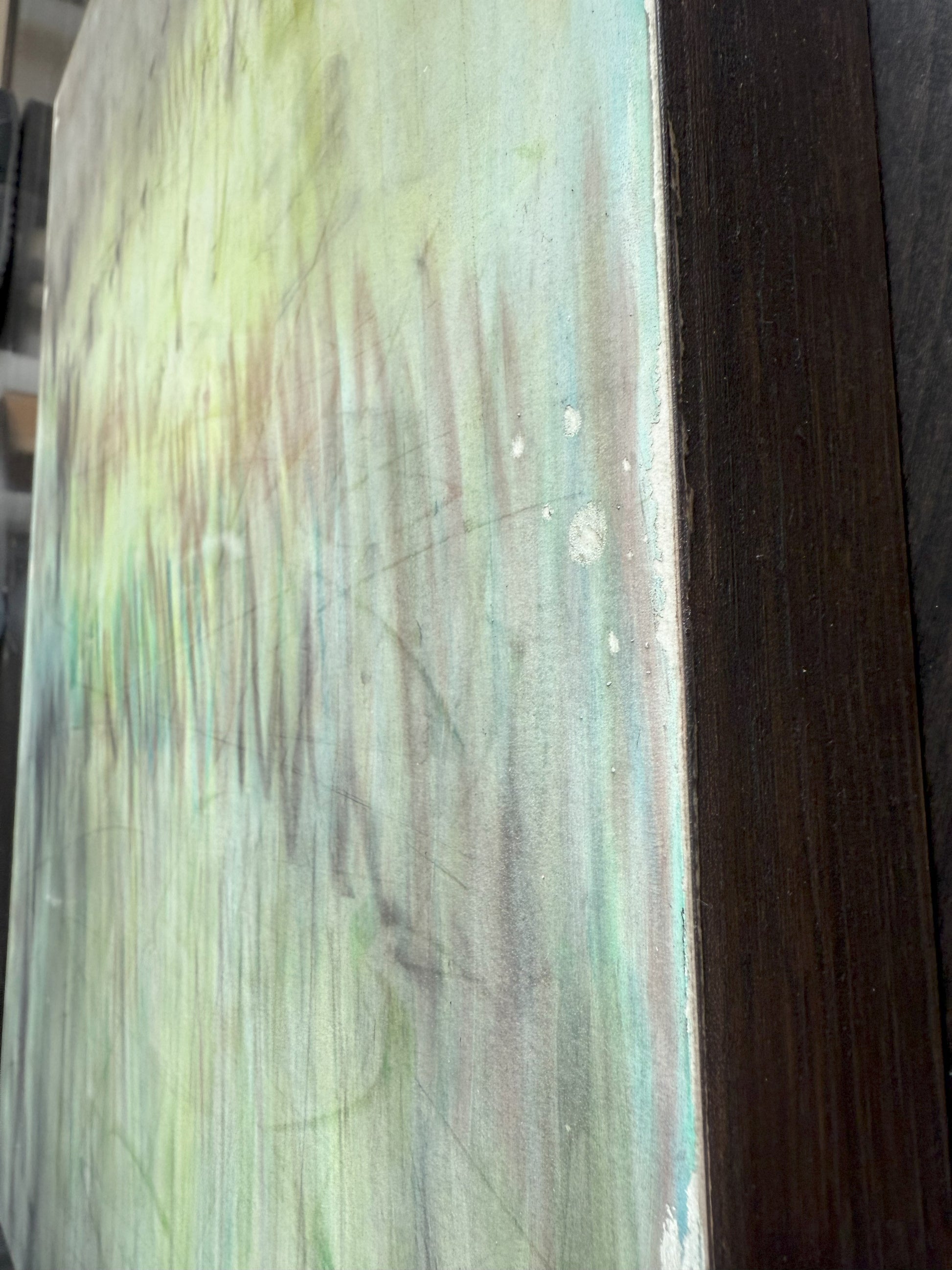 Side view of 'In the Haze' pastel monoprint by Carrie Bergey, showing canvas edge and subtle color transitions in the abstract artwork.