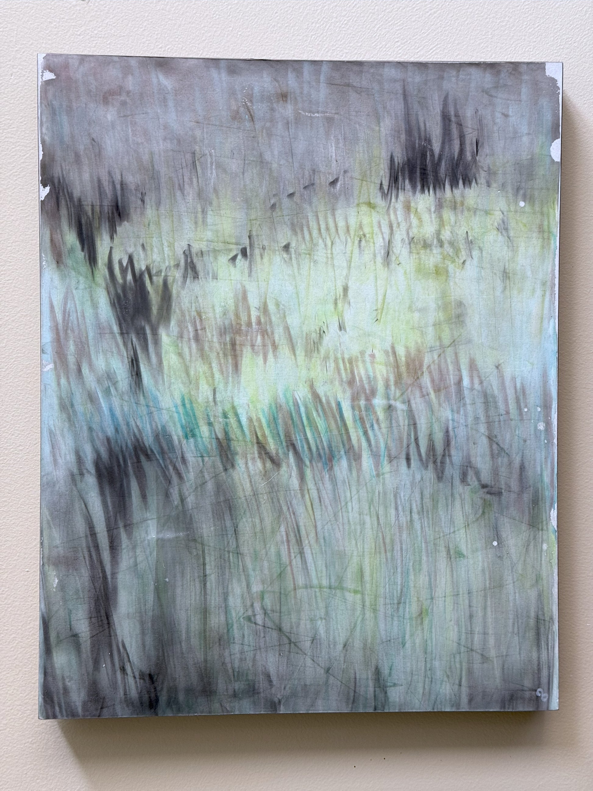 'In the Haze' original pastel monoprint by Carrie Bergey mounted on a wall, displaying its abstract, atmospheric design in soft tones.