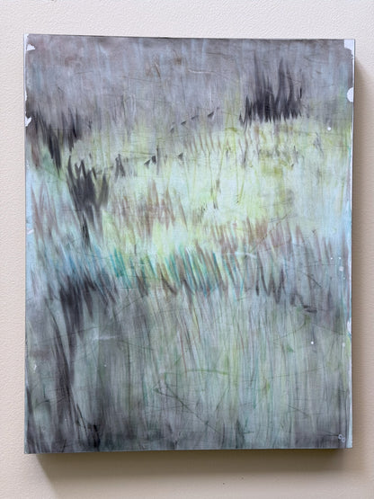 'In the Haze' original pastel monoprint by Carrie Bergey mounted on a wall, displaying its abstract, atmospheric design in soft tones.